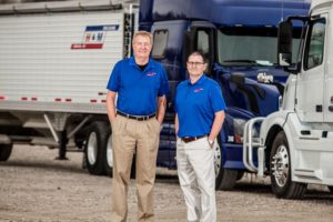 dale and randy in front of truck